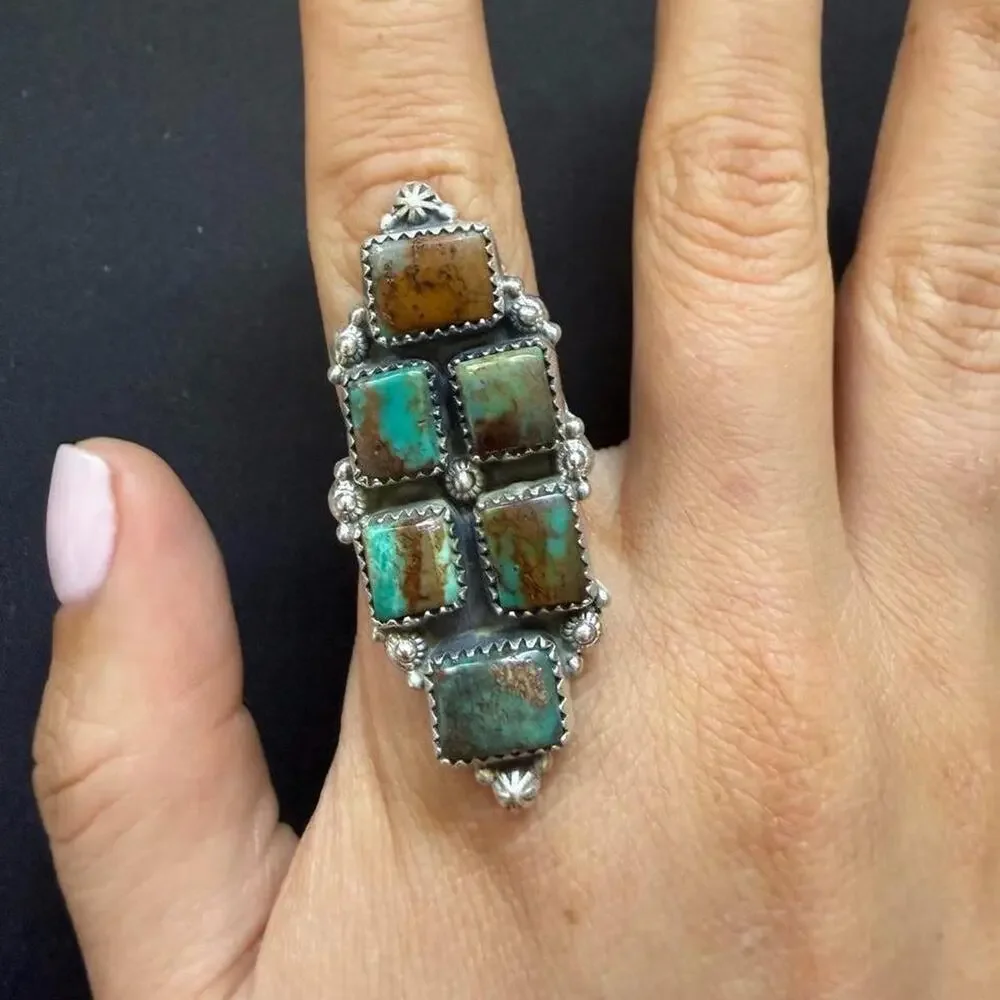 Big beautiful sterling silver multi stone pilot mountain ring. Adjustable